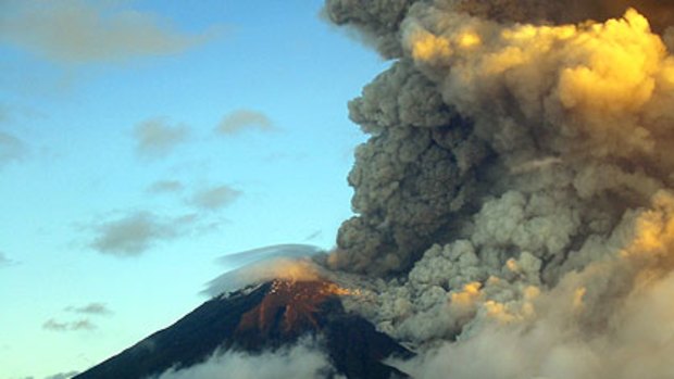 Ash rises from Ecuador's Tunguharua volcano in 2006.