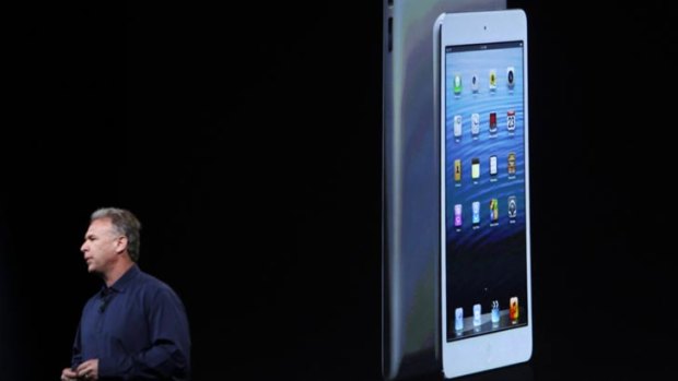 "Not just a shrunken iPad" ... Philip Schiller unveils Apple's new mini tablet.