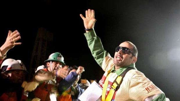 Chilean miner Mario Sepulveda celebrates after been brought to the surface.