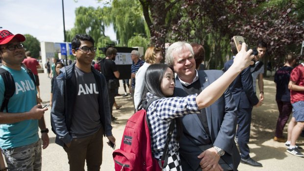 ANU vice chancellor Brian Schmidt poses for selfies at the Commencement Address occasion. Photo Jay Cronan