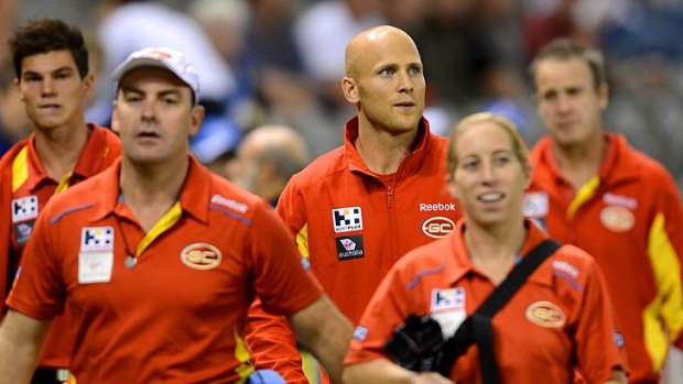 Support crew: Ablett on the sidelines at the North Melbourne game.