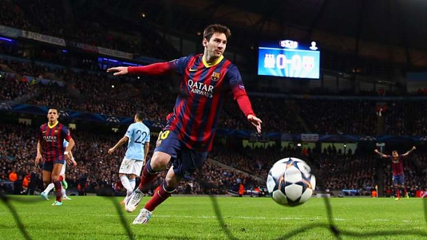 Party time: Barcelona's Lionel Messi celebrates after a penalty against Manchester City.