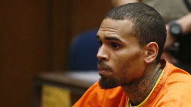 R&B singer Chris Brown appears in court with his attorney Mark Geragos for a probation violation hearing during which his probation was revoked.