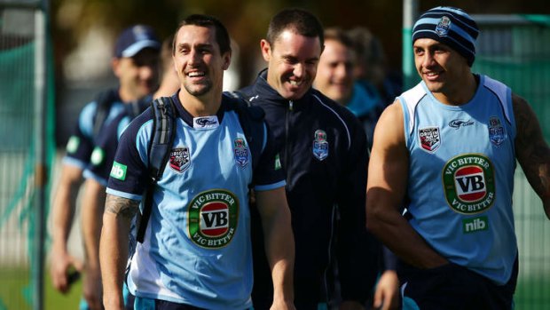 Ready to roll: Mitchell Pearce shares a joke with his Blues teammates before Wednesday's Origin series opener.