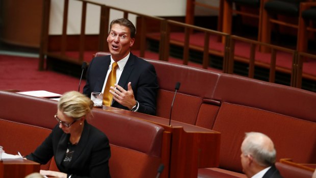 Senator Cory Bernardi sits on the crossbench for the first time during Senate Question Time.
