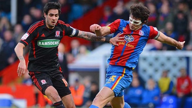 Rhys Williams of Middlesbrough (L) is set to join Mile Jedinak of Crystal Palace (R) as the only regular Australian players in the Premier League.