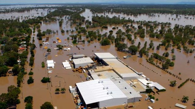 Julia Gillard's flood levy promises to rebuild infrastructure lost in the damaging floods.