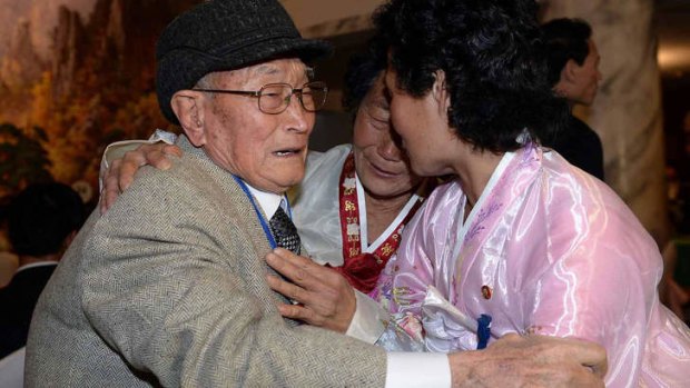 South Korean Ryu Young-Shik, left, 92, meets with his North Korean relatives after being separated for 60 years.