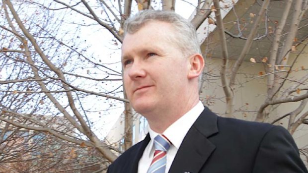 "The previous calls for Premier [Campbell] Newman to reduce green tape can only be described as utter hypocrisy" ... Federal Environmental Minister, Tony Burke, pictured.