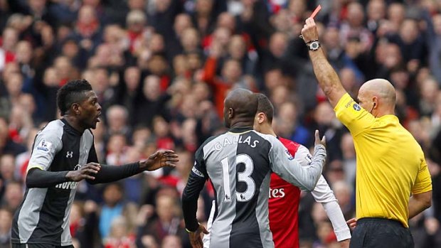 Shown red ... Tottenham's Emmanuel Adebayor.