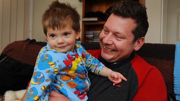 Rescued ... Dan Shadur with his 18-month-old son Max.