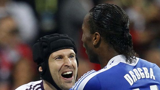 Old guard heroes ... Didier Drogba and goalkeeper Petr Cech celebrate after winning the penalty shootout.