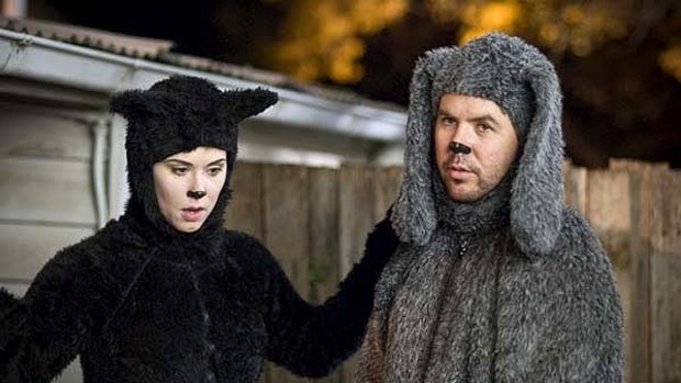 A feline-costumed Kestie Morassi with Wilfred (Jason Gann).