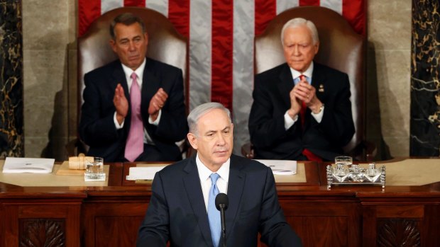 Damning of Obama's proposed nuclear deal with Iran ... Israeli Prime Minister Benjamin Netanyahu (centre) addresses a joint meeting of Congress in the House Chamber on Capitol Hill in Washington.