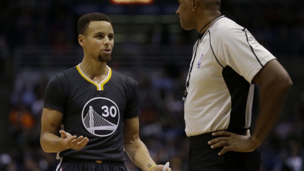 First loss: Stephen Curry talks to the referee after getting called for a technical foul.