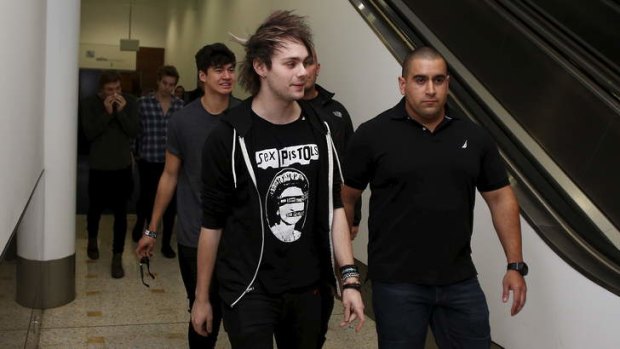 5 Seconds of Summer's Michael Clifford arrives at Sydney Airport on Monday morning.