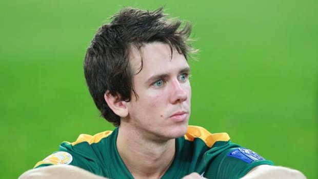 Robbie Kruse feels the pain of defeat.