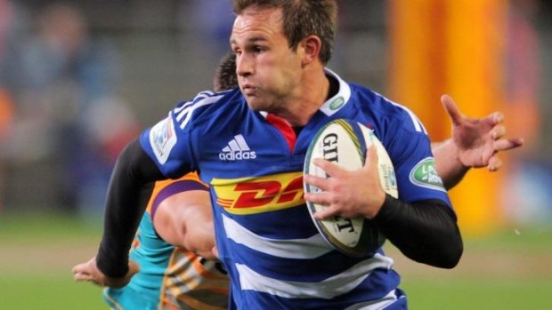 Nic Groom of the Stormers breaks clear of the Cheetahs defence.