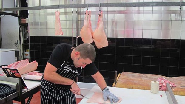 Gary Munro prepares pig skin to make the perfect crackling at Gary McBean's butchery class at Prahan Market.