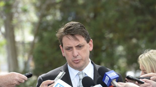 Hard times: Racing Victoria chief steward Terry Bailey speaks to the media on Wednesday following the deaths of Araldo and Admire Rakti.