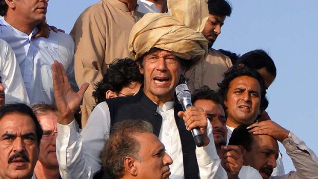 Latest test ... Imran Khan addresses supporters at the march.