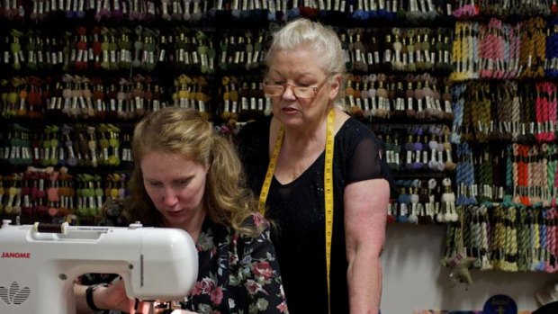 Everything old is new again &#8230; Beverley Barter, who runs vintage dressmaking classes from her studio in Penshurst, watches over Alyshia Hansen, who loves the feminine, flattering looks of the '40s.