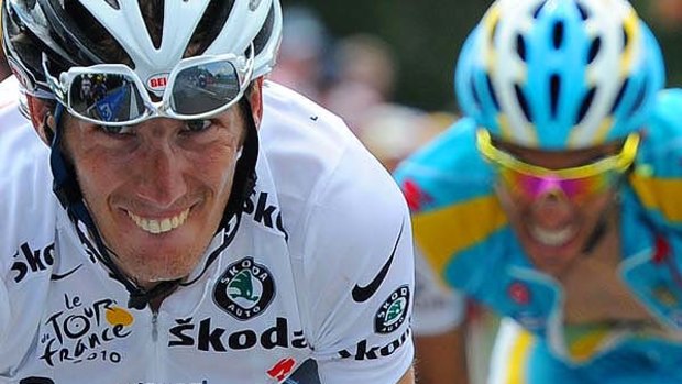 Andy Schleck of Luxembourg rides to the victory ahead of Spain's Alberto Contador on stage eight of the Tour de France.