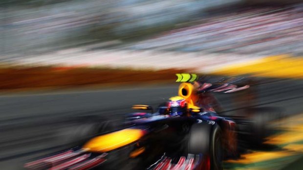 All a blur &#8230; Mark Webber pilots his Red Bull-Renault around the Albert Park circuit yesterday during the final practice.
