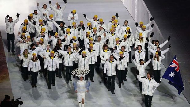 Cool dudes: Snowboarder Alex Pullin leads the Australian team at the Sochi Winter Olympics opening ceremony.