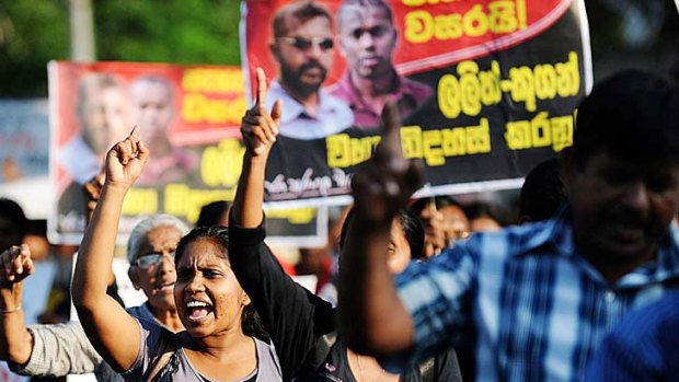 Sri Lankan Socialist Party activists demonstrate in Colombo on Monday, the first anniversary of the disappearance of two of their colleagues in the northern district of Jaffna. Normalcy is yet to return to the north more than three years after the civil war ended.