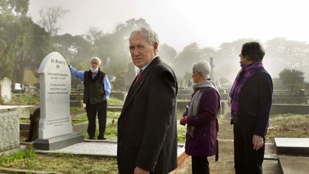 Owen Peake (left), David Beauchamp, Lyn Howden and Di Tibbits stand with the headstone erected on the site of John Harry Grainger's previously unmarked grave.