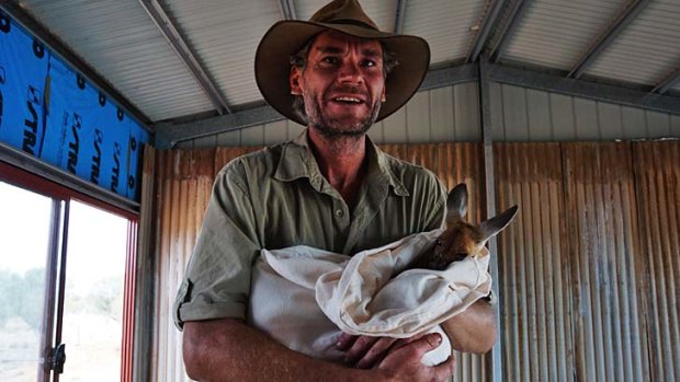 Chris "Brolga"  Barnes at his kangaroo sanctuary on the outskirts of Alice Springs.