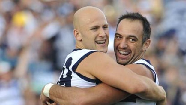 Gary Ablett and James Podsiadly lap it up.