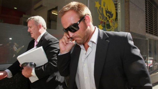 Former NRL player Ryan Tandy leaves City Central Police Station in February 2011.