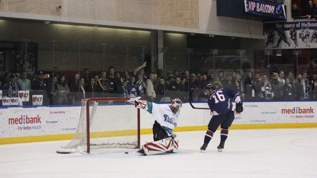 Matt Armstrong scores on the breakaway, pleasing the throng at the South Pole end of the Icehouse.