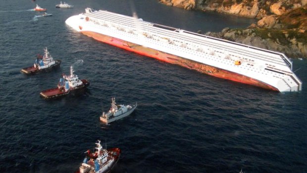 Death scene ... An aerial view of the Costa Concordia, after the cruise ship ran aground off the Isola del Giglio.