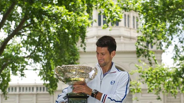 Novak Djokovic with his Australian Open trophy in Carlton Gardens: ''It was actually quite a good match.''