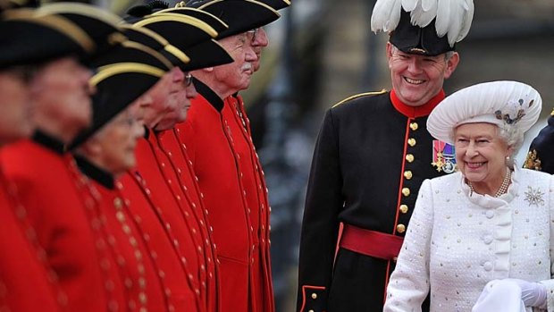 Queen Elizabeth II is greeted at Chelsea Pier.
