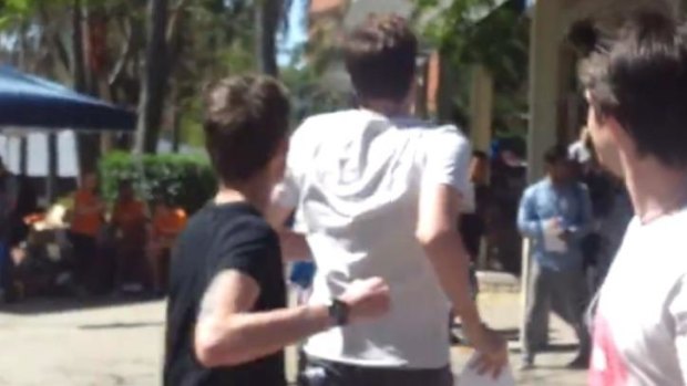 Still image from a video, posted online, of an assault at the University of Queensland during campaigning for UQ Union elections.