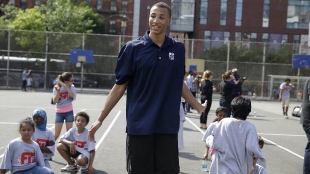 Dante Exum with children during a clinic in New York on Wednesday.