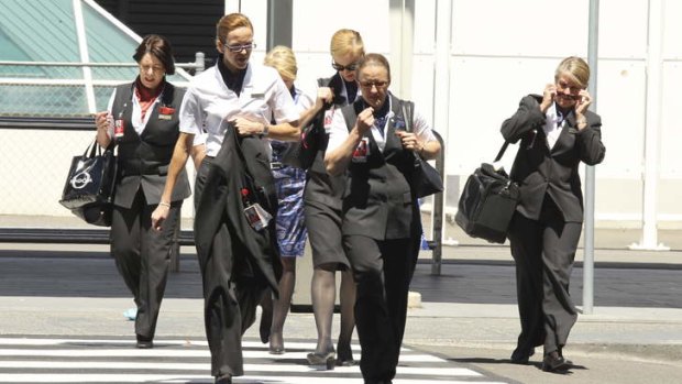Qantas staff leaving Sydney international airport.