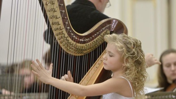Something extraordinary: harpist Alisa Sadikova, 11, will perform at City Recital   Hall with three other internationally renowned harpists.