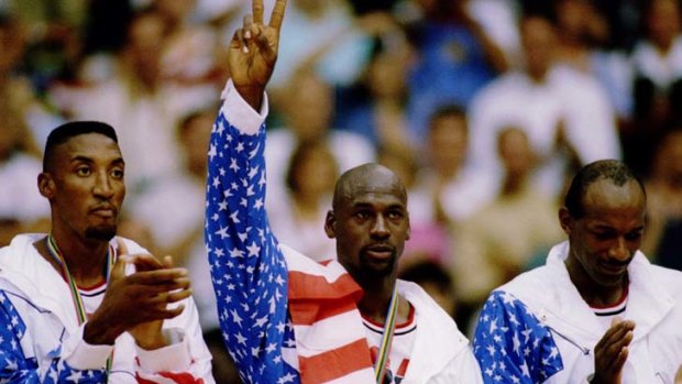 Living the dream ... Michael Jordan, middle, Scottie Pippen, left and Clyde Drexler acknowledge the crowd after receiving their gold medals.