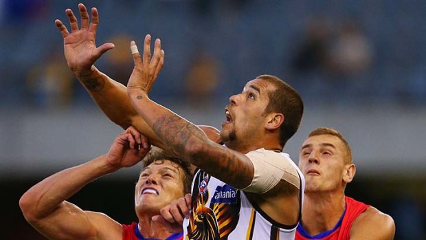 Buddy system: Lance Franklin (centre) is likely to be rested as Hawthorn rotate the line-up with many players returning.