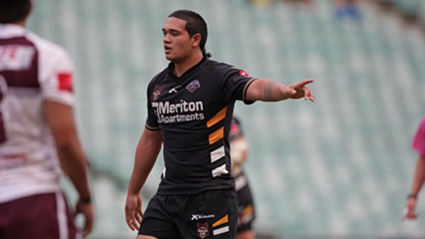 Big unit ... Wests Tigers Toyota Cup (under-20s) player Ben Murdoch in action against Manly on Monday. He arrived to go to school on the Gold Coast weighing 150 kilograms.