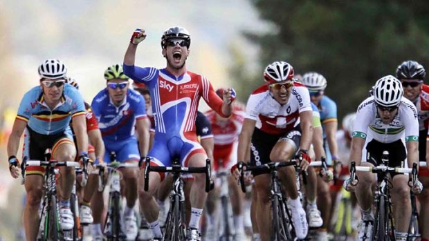 Just great: Another sprint win for Mark Cavendish (centre), silver to Australia's Matt Goss (right).