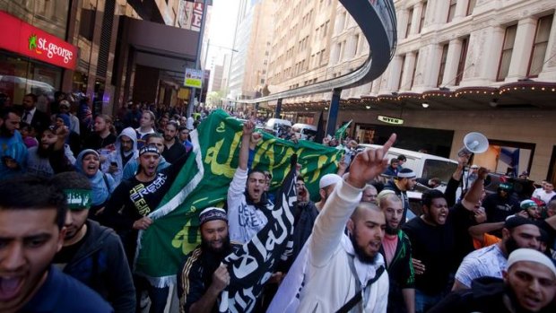 Protesters marching through Sydney's CBD yesterday.