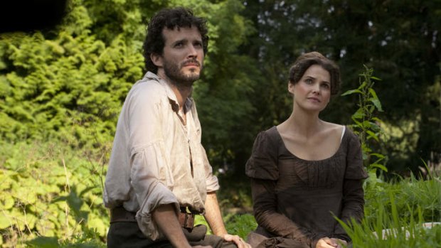Keri Russell and Bret McKenzie share a moment of reflection in the romantic comedy <i>Austenland</i>.