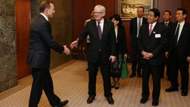 Prime Minister Tony Abbott and Trade Minister Andrew Robb in Tokyo on Monday.