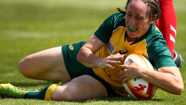Tricia Brown scores for Australia against Wales.